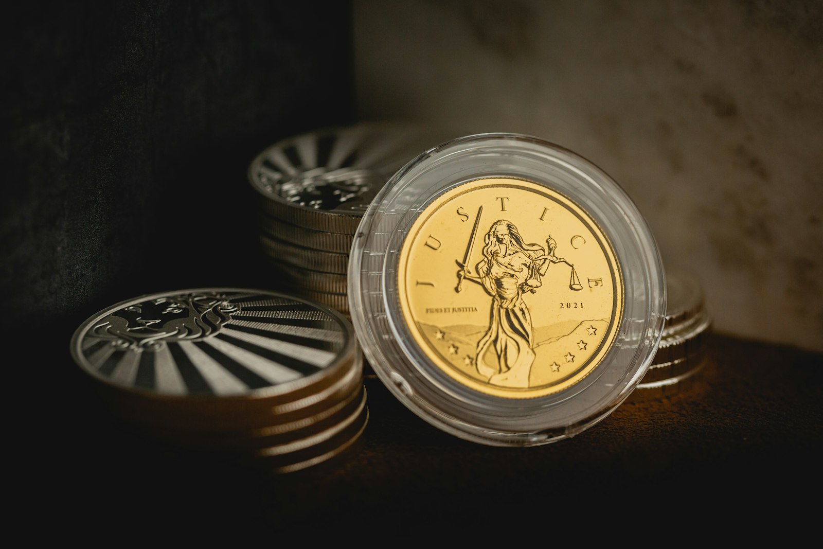 Stacks of gold and silver coins arranged together