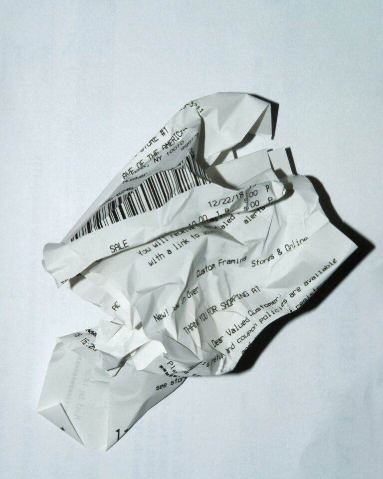A paper receipt on a white surface